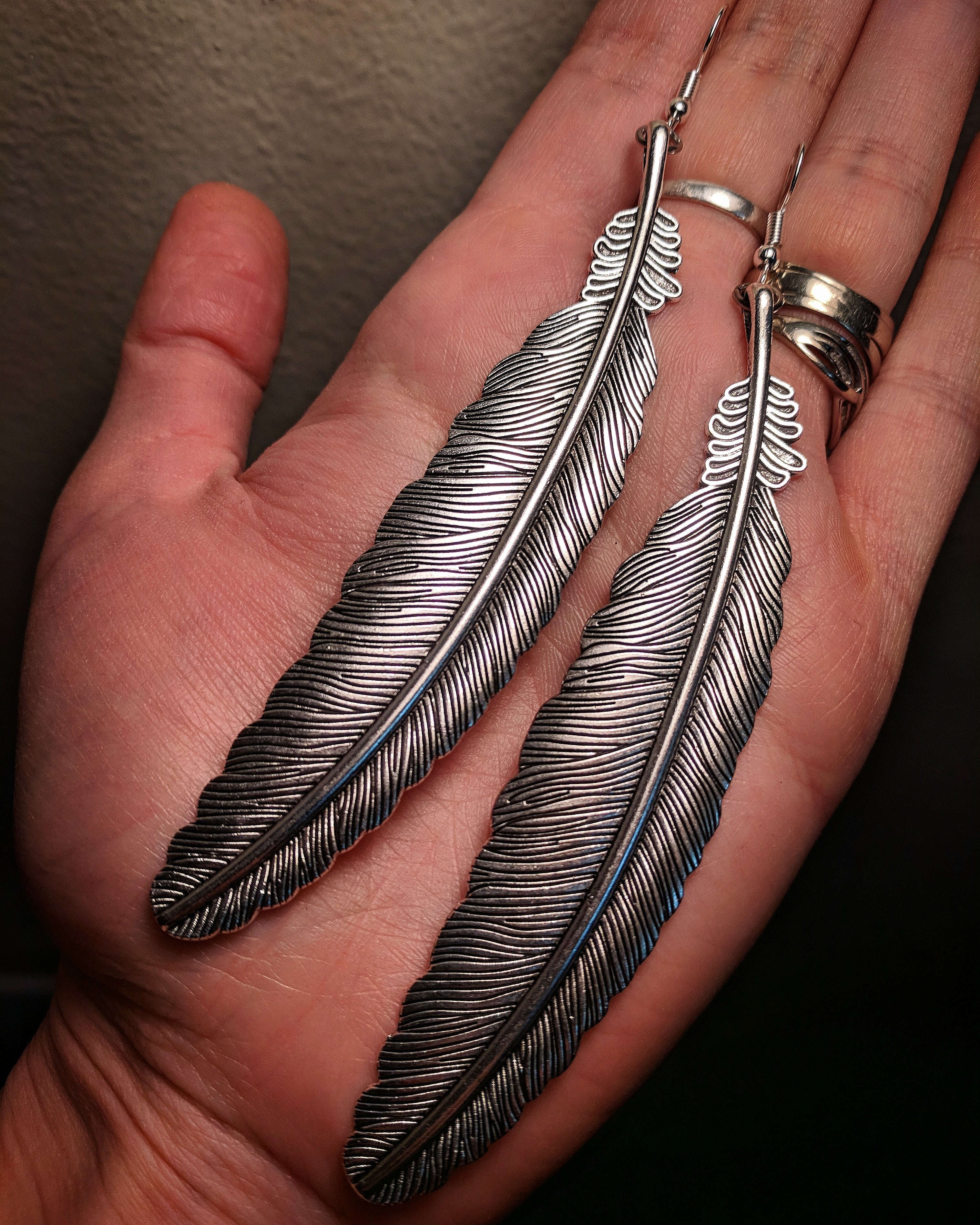 Dramatic Statement Silver Colored Large Feather Earrings With